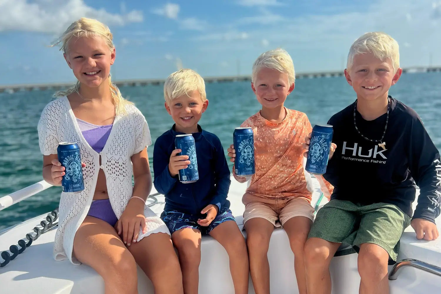 Kids drinking Nordic Blue Water